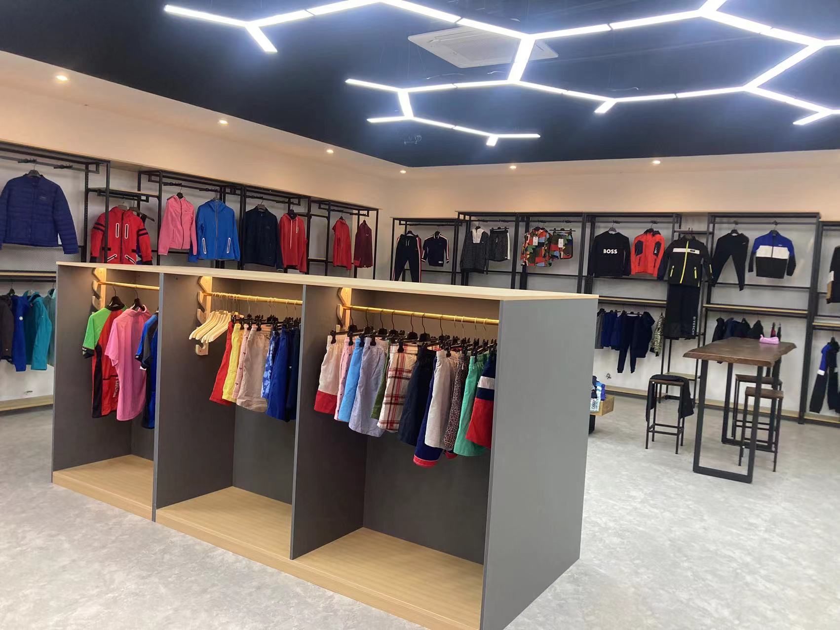 Technical outerwear showroom display with apparel samples