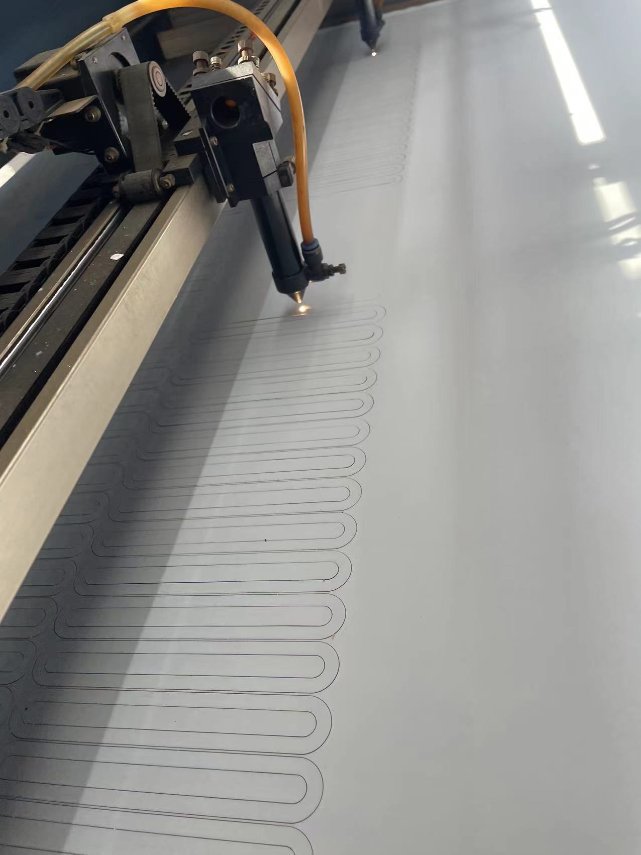 Laser cutting process at a production-partner facility