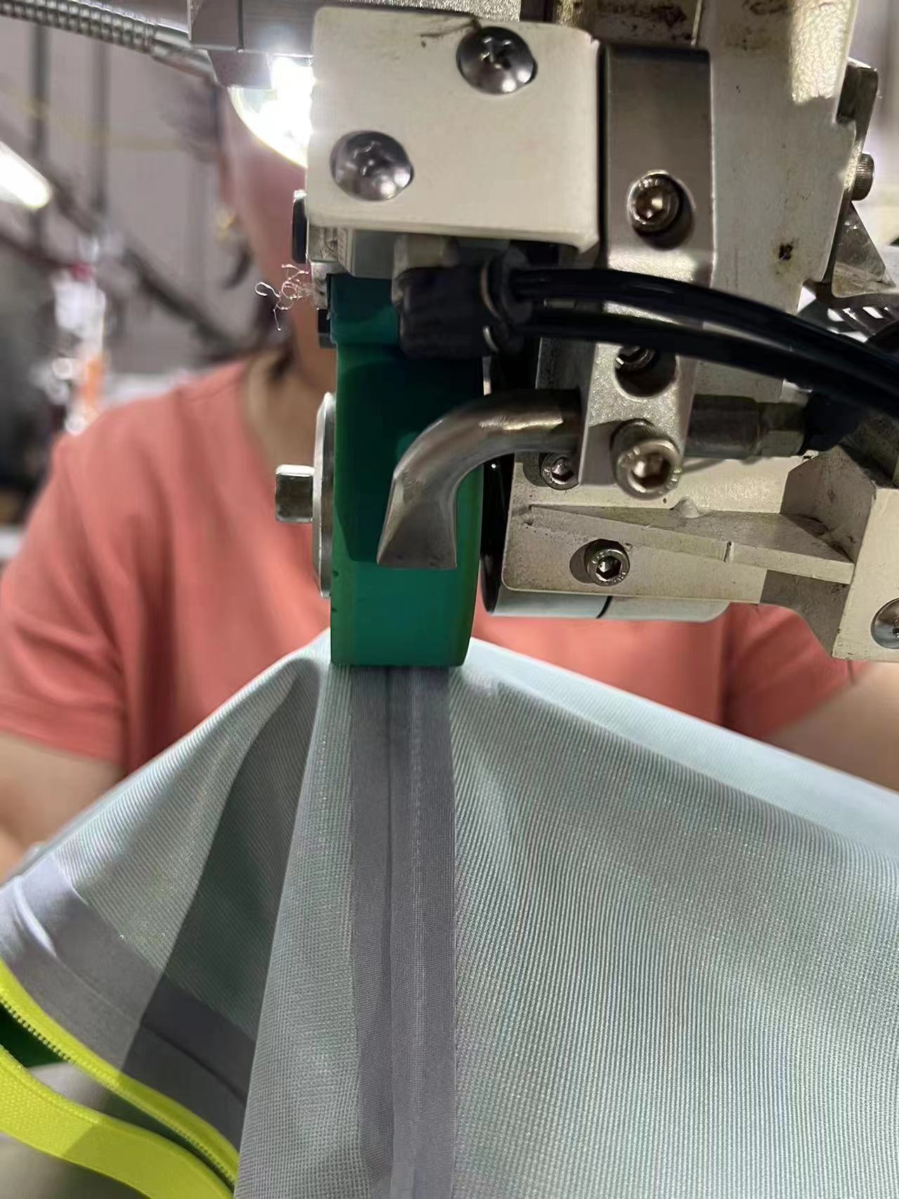 Seam sealing process for weather-layer garments